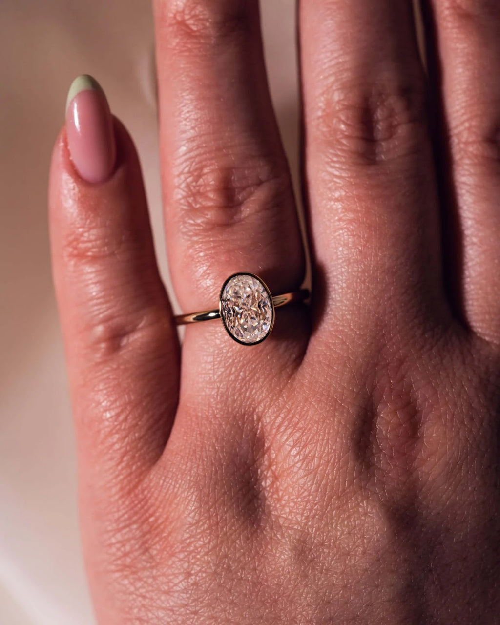 Oval Diamond Brilliance Bezel Solitaire Engagement Ring