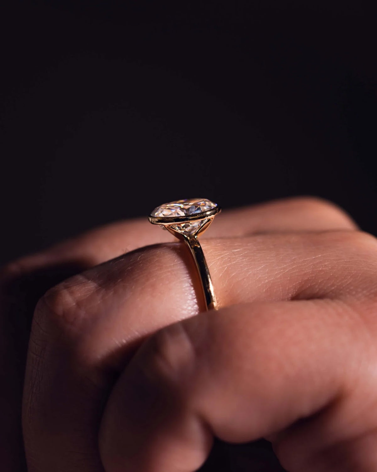 Oval Diamond Brilliance Bezel Solitaire Engagement Ring