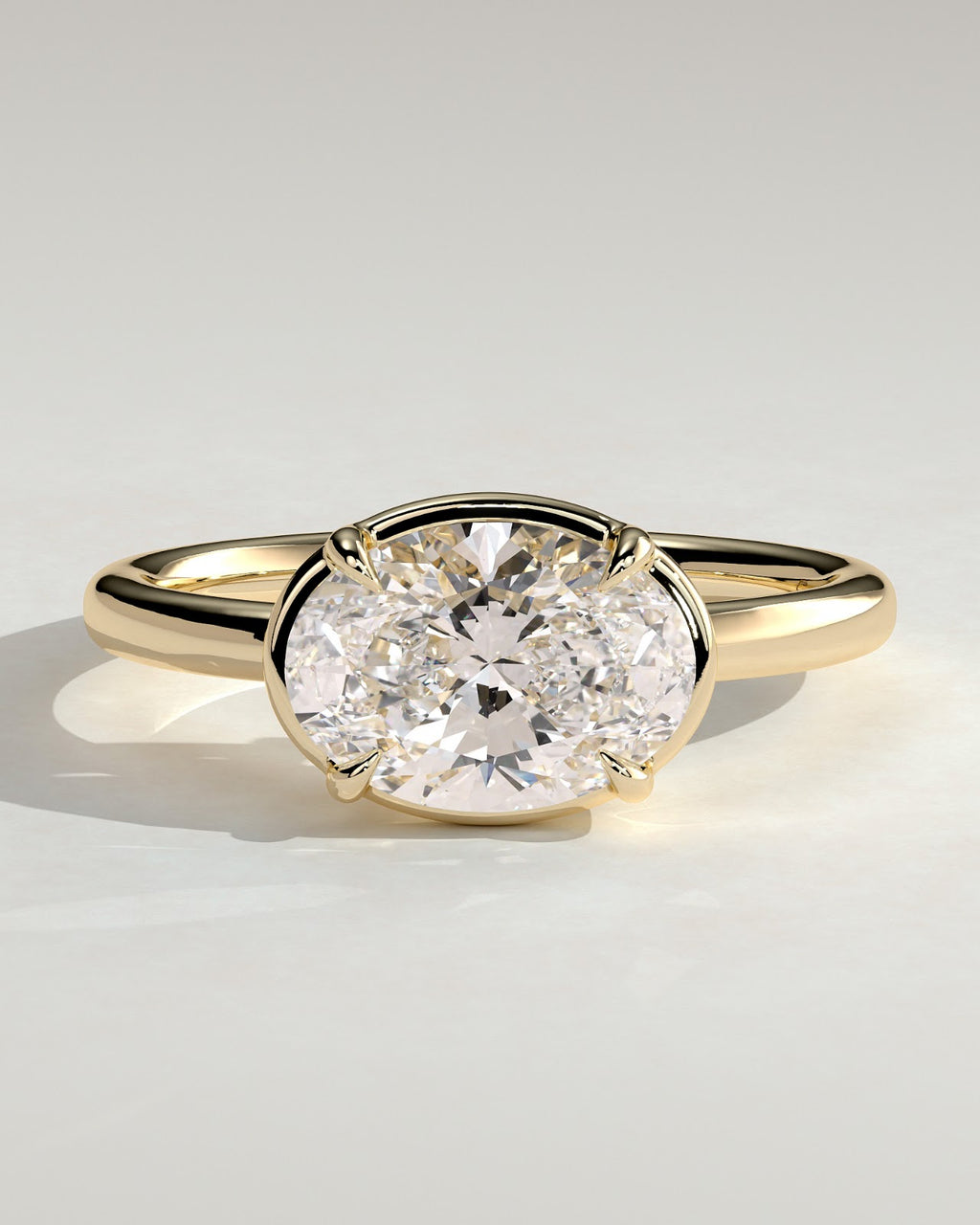 Oval Diamond East West Bezel Frame Engagement Ring