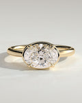Oval Diamond East West Bezel Frame Engagement Ring