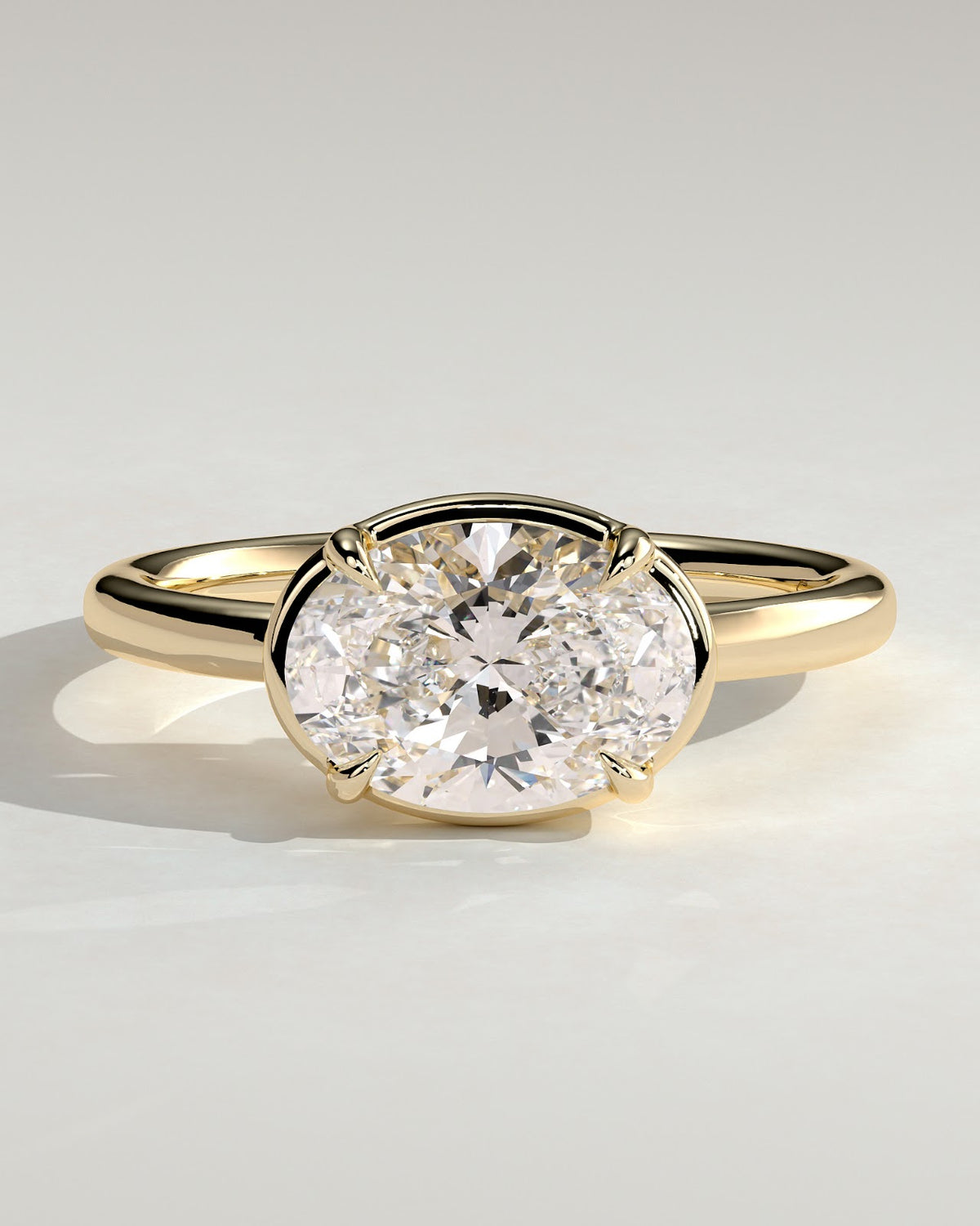 Oval Diamond East West Bezel Frame Engagement Ring