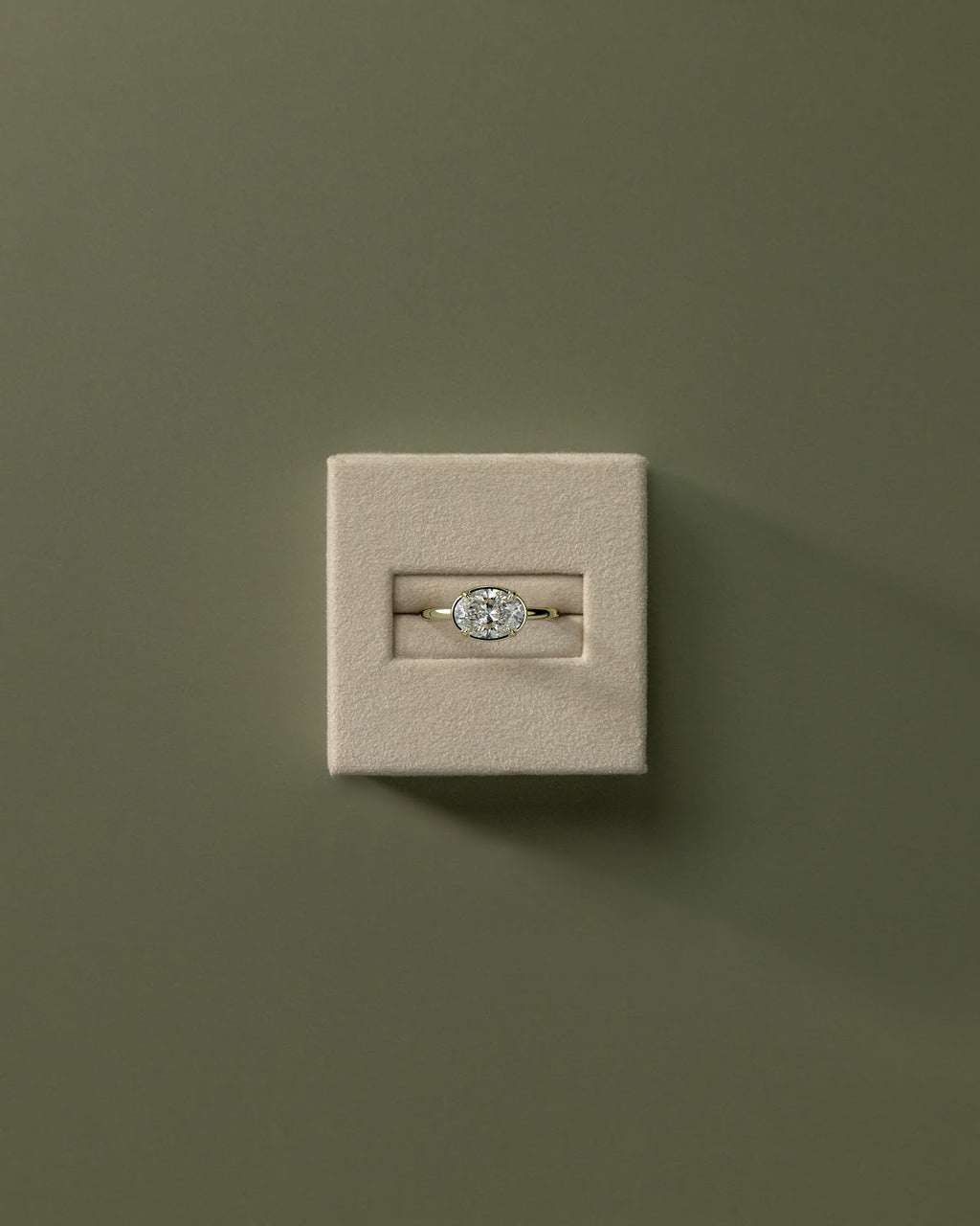 Oval Diamond East West Bezel Frame Engagement Ring