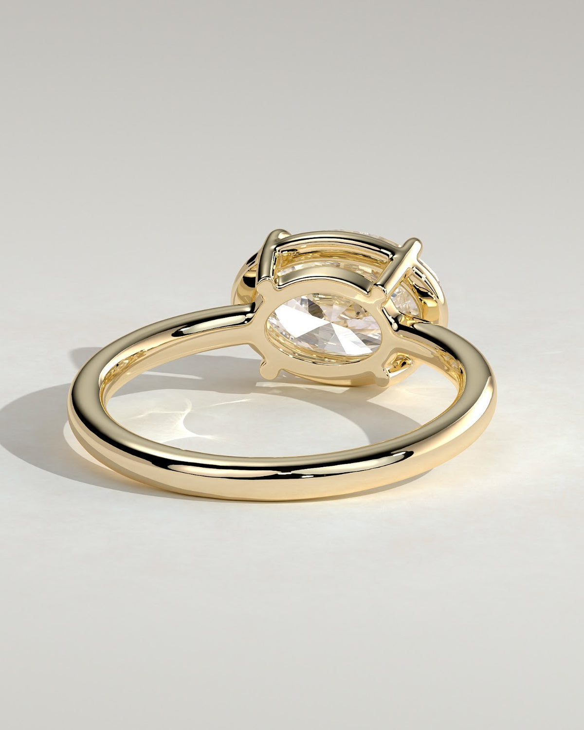 Oval Diamond East West Bezel Frame Engagement Ring