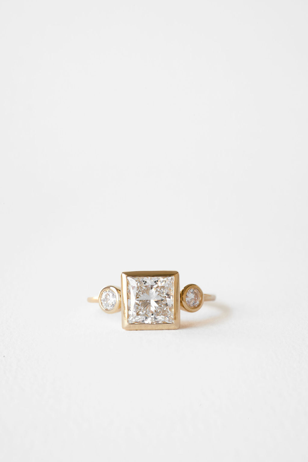 Oval Diamond Floating Bezel Engagement Ring
