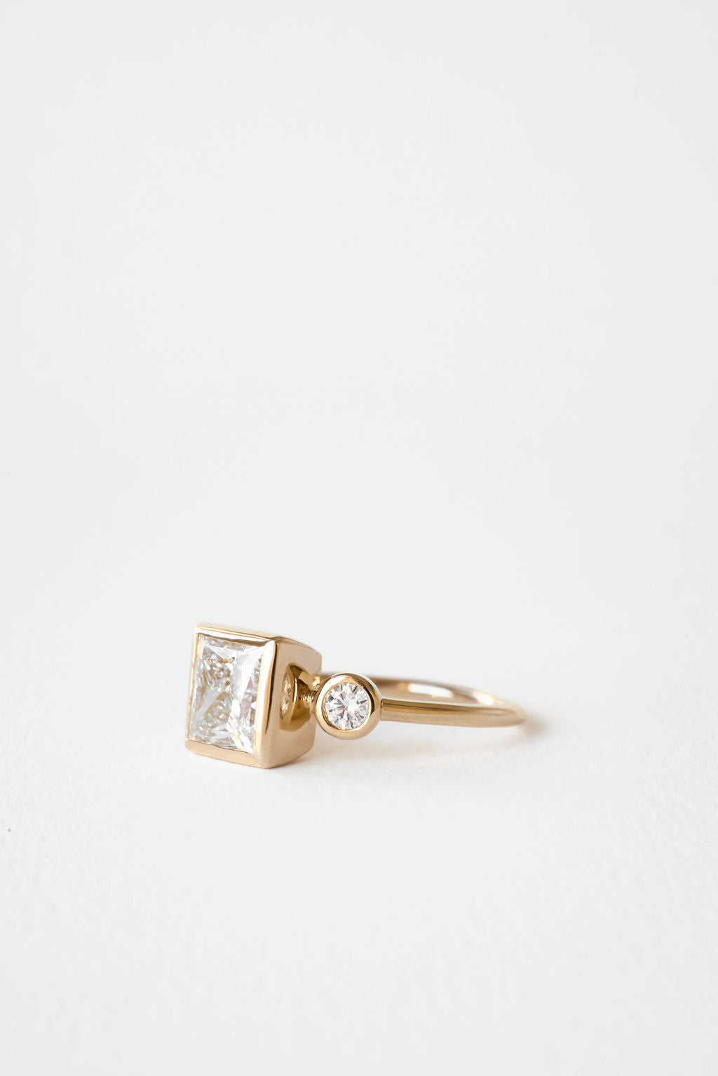 Oval Diamond Floating Bezel Engagement Ring