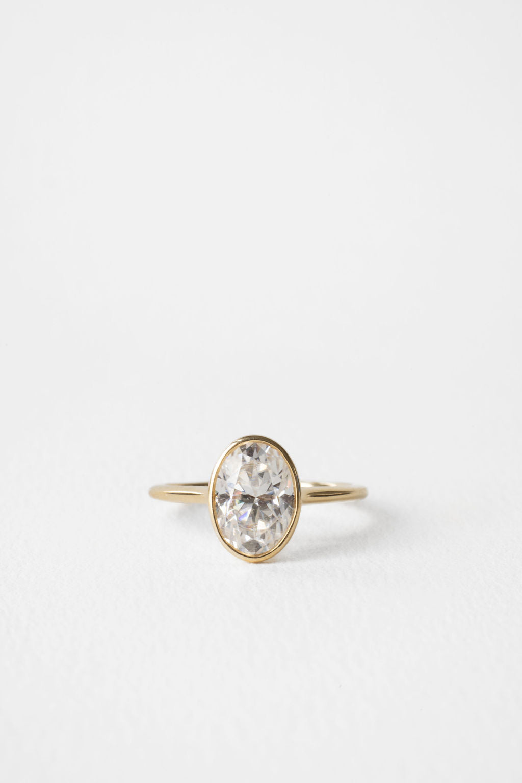 Oval Diamond Illuminated Cluster Engagement Ring