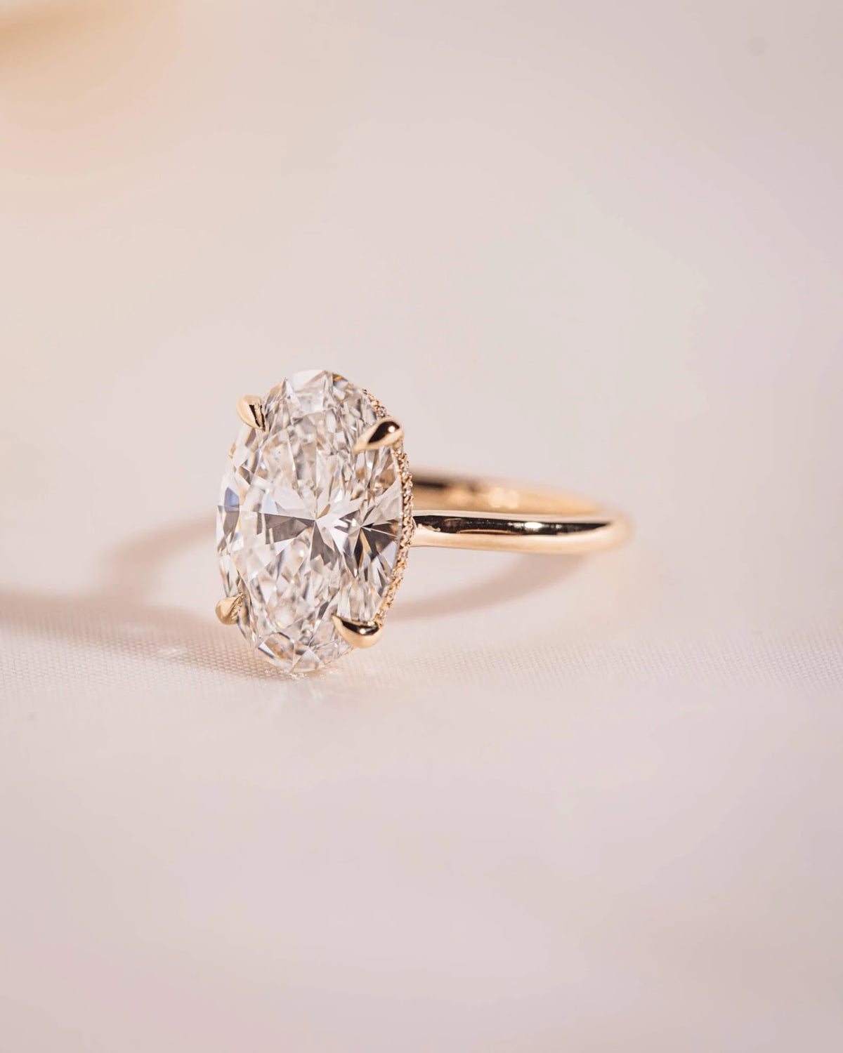 Oval Diamond Minimal Hidden Halo Engagement Ring
