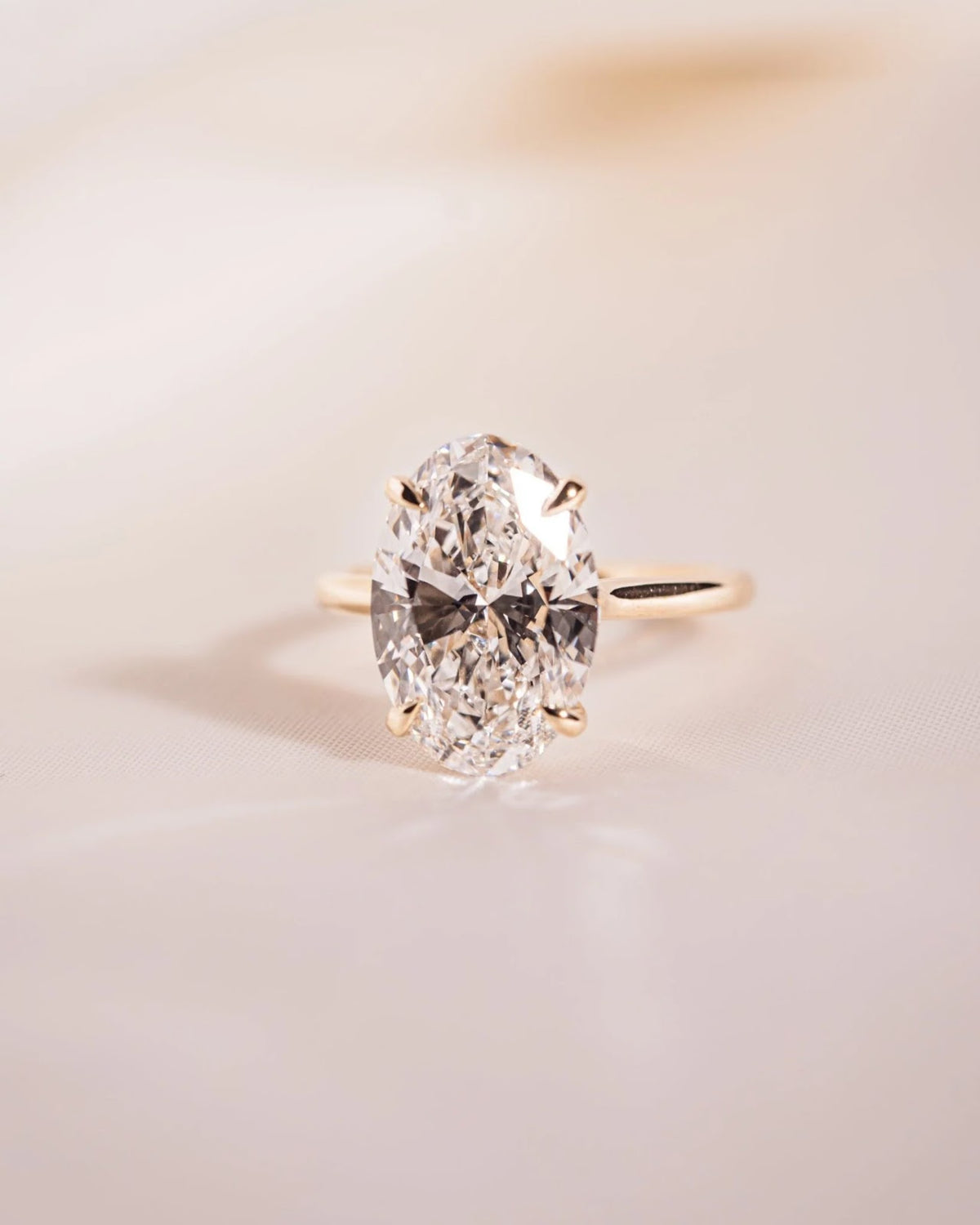 Oval Diamond Minimal Hidden Halo Engagement Ring