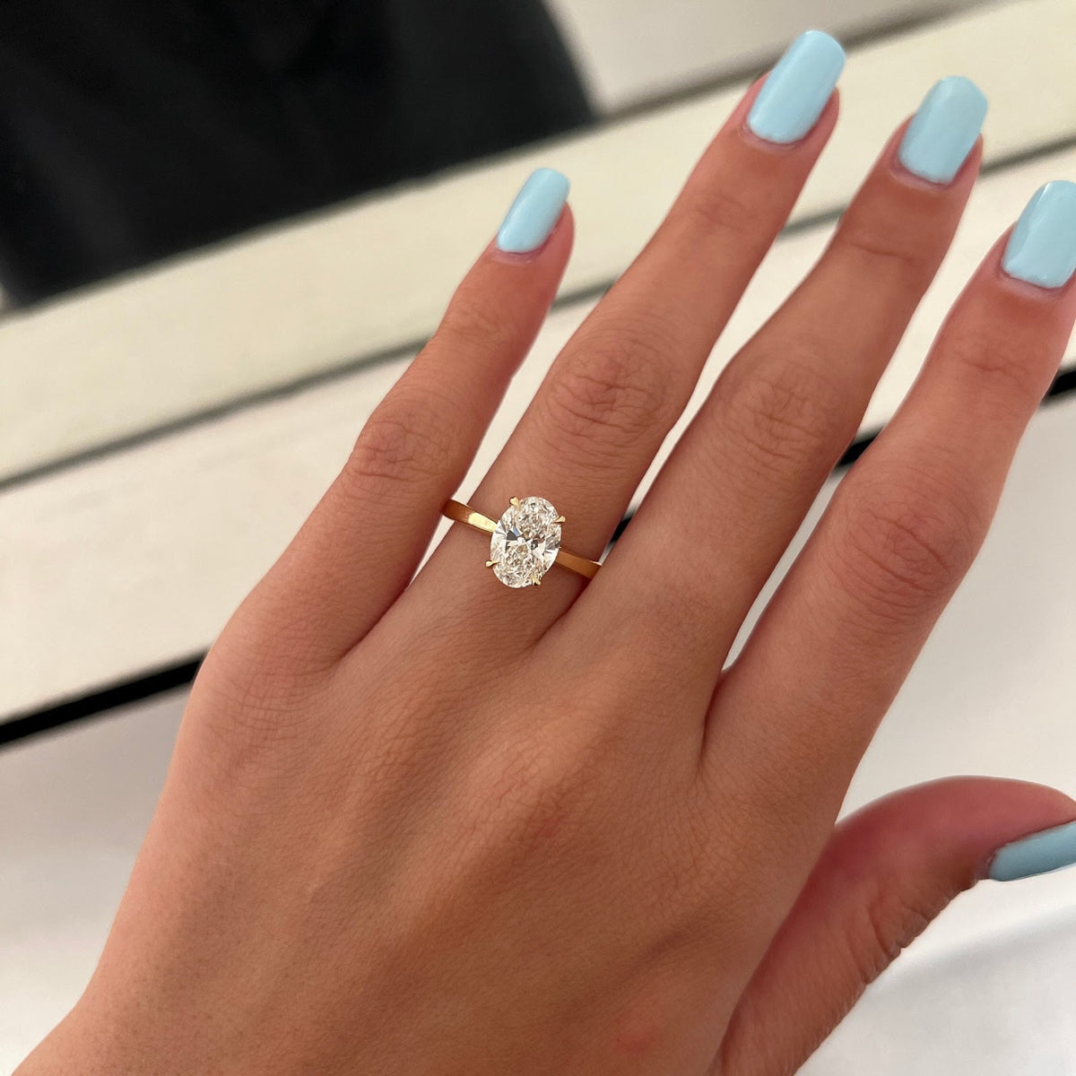 Oval Diamond Raised Hidden Halo Cathedral Engagement Ring