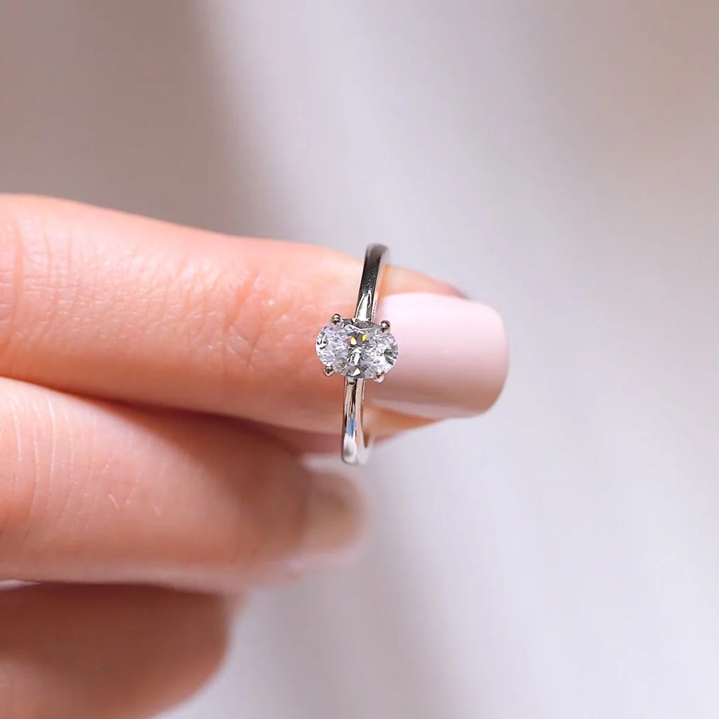 Oval Diamond Refined Tapered Solitaire Engagement Ring