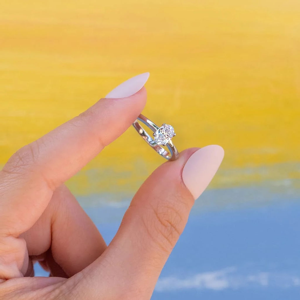Oval Diamond Refined Tapered Solitaire Engagement Ring