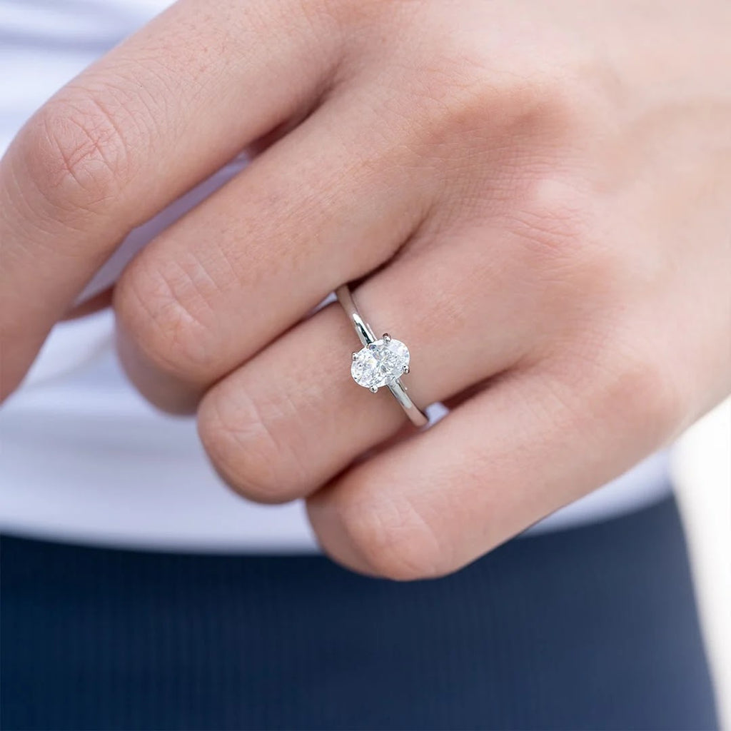 Oval Diamond Refined Tapered Solitaire Engagement Ring
