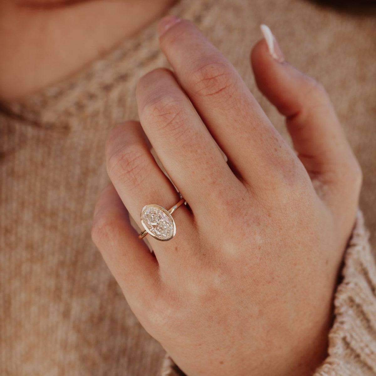 Oval Diamond Smooth Bezel Solitaire Engagement Ring
