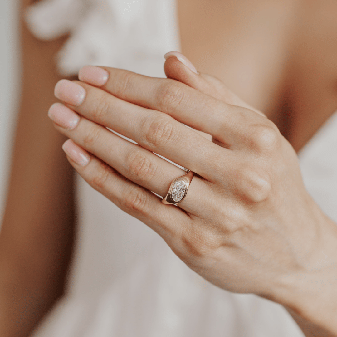 Oval Diamond Tapered Bezel Engagement Ring