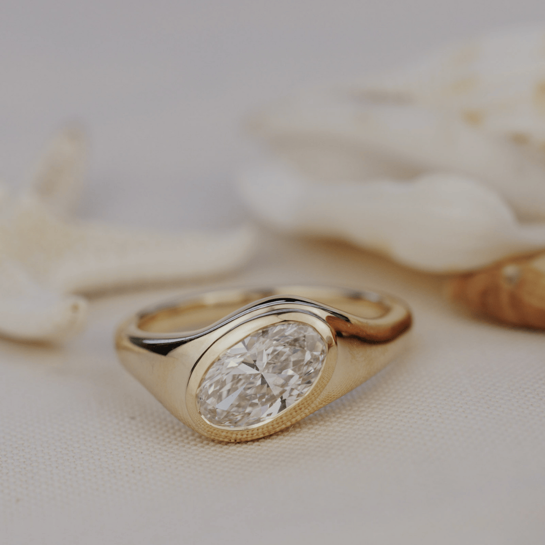 Oval Diamond Tapered Bezel Engagement Ring