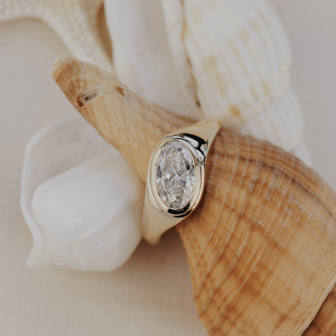 Oval Diamond Tapered Bezel Engagement Ring