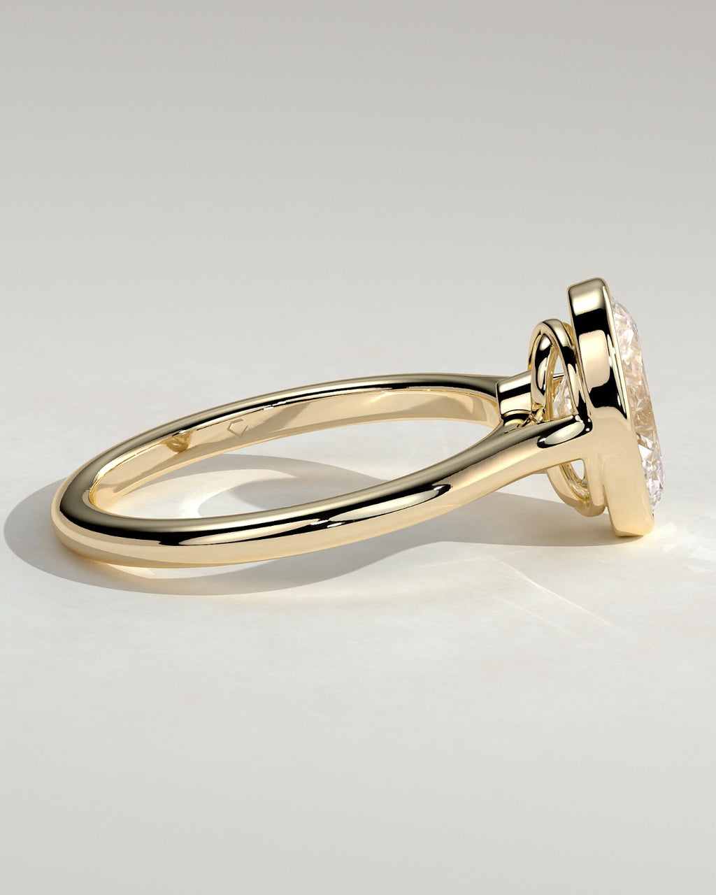 Oval Diamond Twist Gallery Bezel Solitaire Engagement Ring