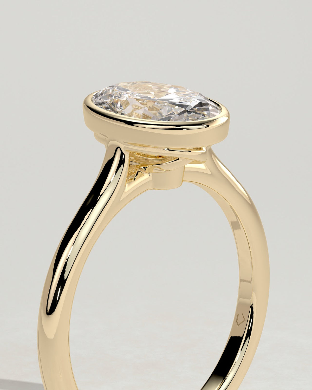 Oval Diamond Twist Gallery Bezel Solitaire Engagement Ring
