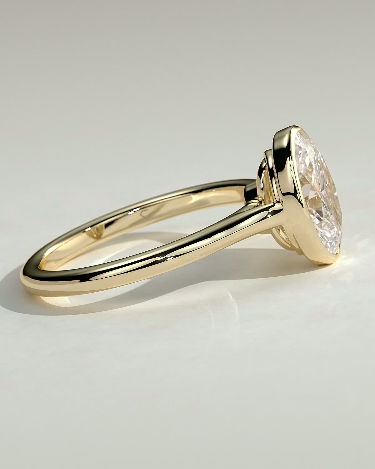 Oval Diamond Twist Gallery Bezel Solitaire Engagement Ring