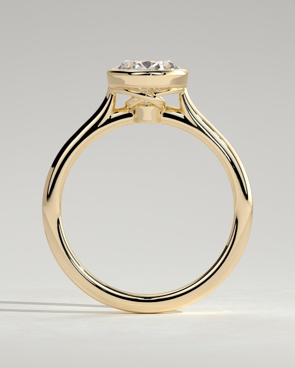 Oval Diamond Twist Gallery Bezel Solitaire Engagement Ring