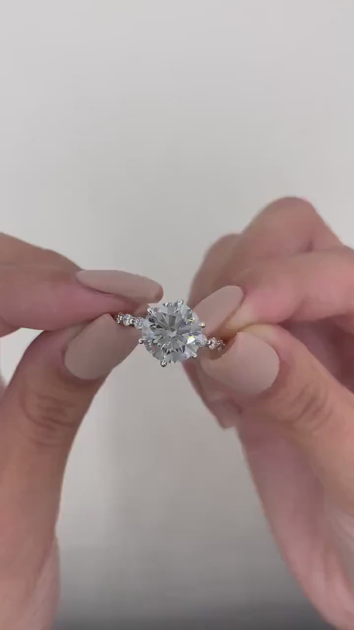 Round Diamond Pave Engagement Ring featuring brilliant round cut and elegant pave band