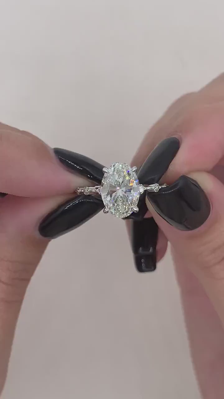 Oval Diamond Dainty Engagement Ring with delicate band and sparkling oval cut diamond