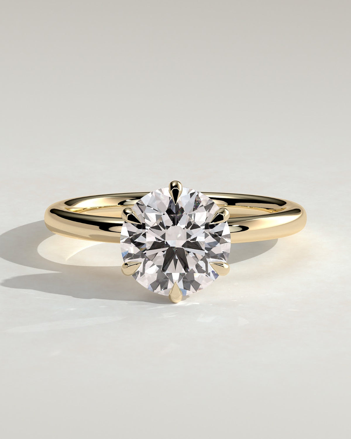 Round Diamond Encircled Hidden Halo Engagement Ring