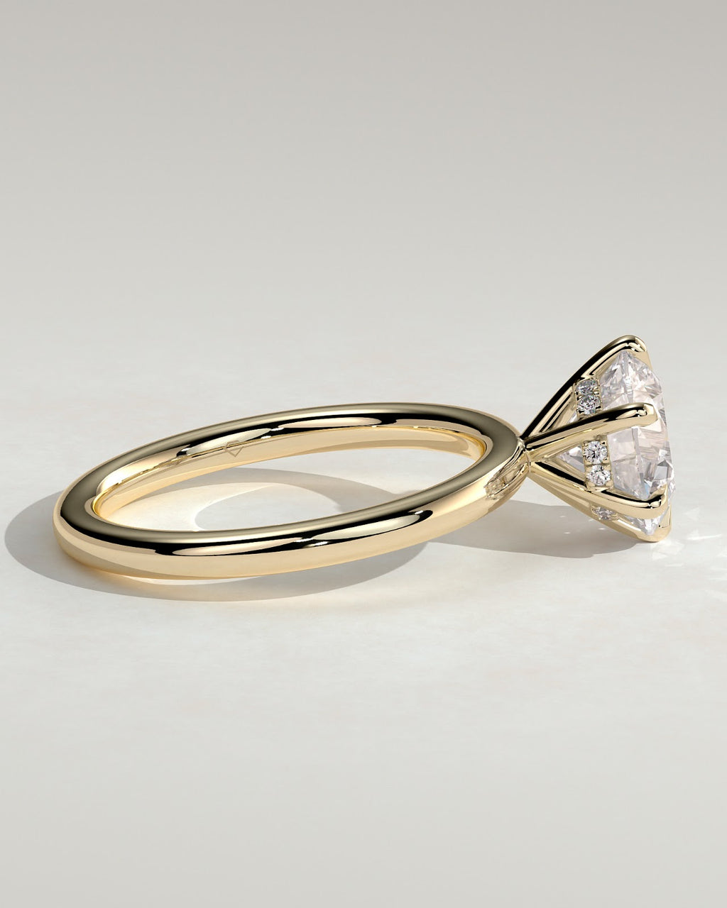 Round Diamond Encircled Hidden Halo Engagement Ring