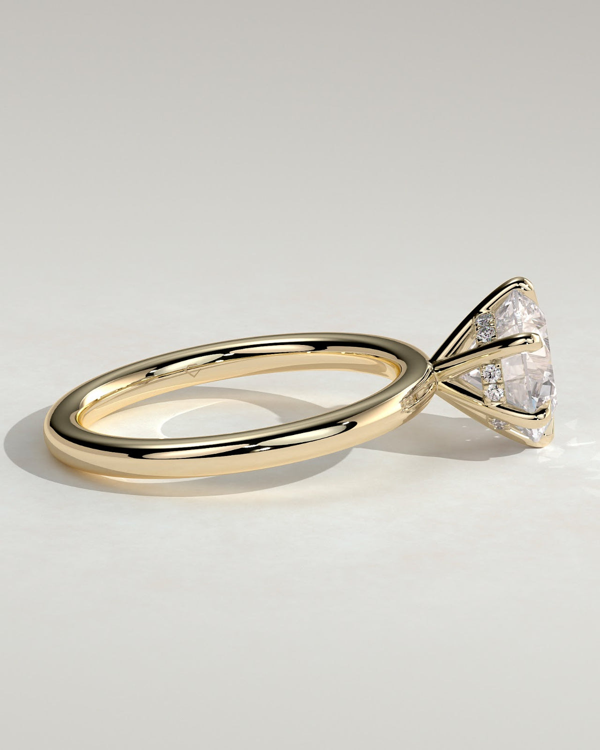 Round Diamond Encircled Hidden Halo Engagement Ring